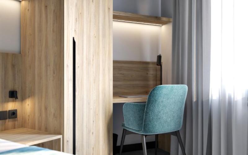 Beispiel eines Doppelzimmers mit türkisem Dekor im Hotel Zdravilisce Lasko