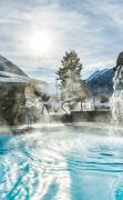 Aussenpool im Garten mit beeindruckendem Bergpanorama im SPA-Hotel Jagdhof